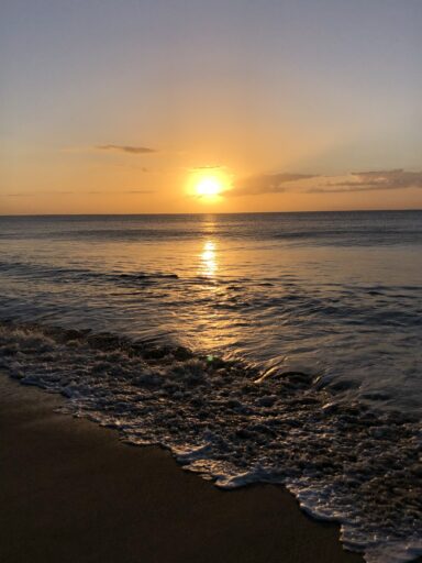 Sunrise at the water's edge on the beach in San Jose del Cabo