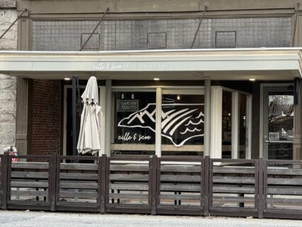 Front window door and outdoor seating of 'cille & 'scoe